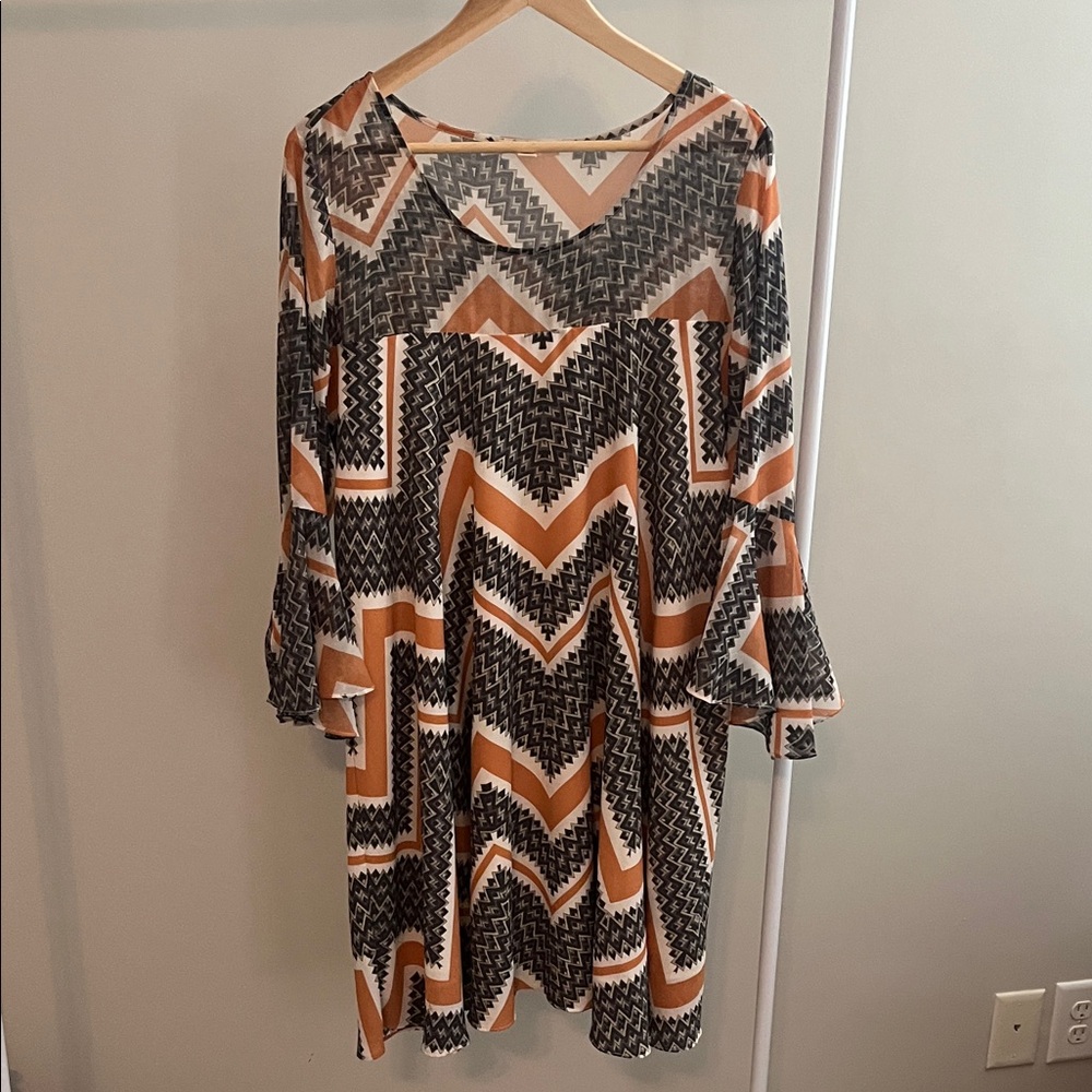 Paper Crown from Anthropologie. Geometric Pattern Dress in Navy and Orange